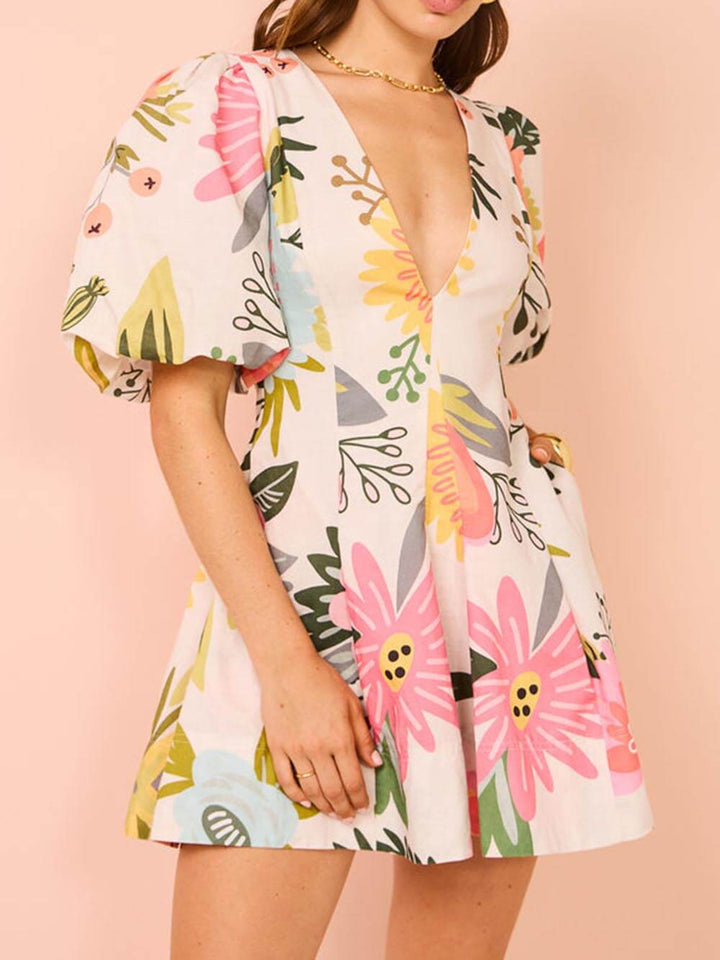 Lyra | Mini-robe à manches bouffantes imprimé floral avec poches