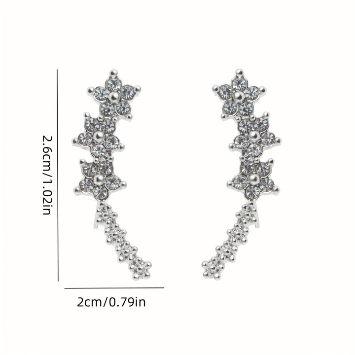 MOREL & LAURENT PARIS | BOUCLES D’OREILLES FLORALES INTEMPORELLES