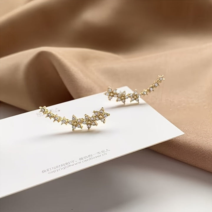 MOREL & LAURENT PARIS | BOUCLES D’OREILLES FLORALES INTEMPORELLES