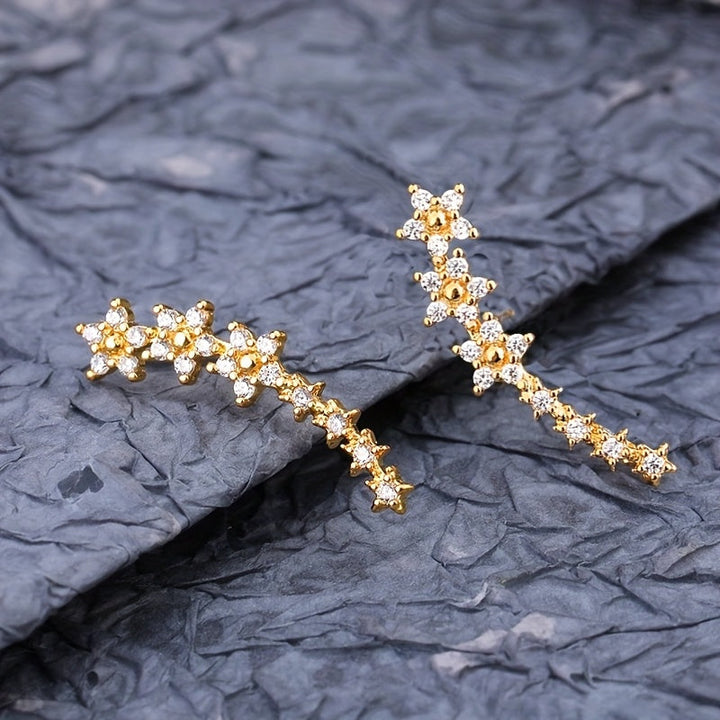 MOREL & LAURENT PARIS | BOUCLES D’OREILLES FLORALES INTEMPORELLES