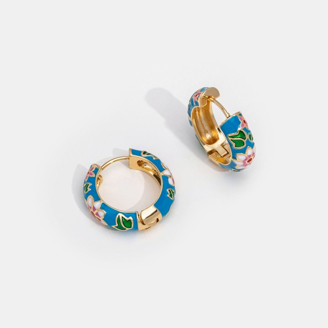 MOREL & LAURENT PARIS | BOUCLES D’OREILLES EN CERCLE DORÉ AVEC FLEUR
