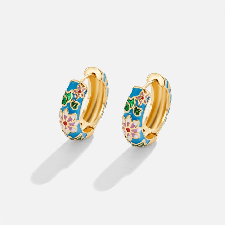 MOREL & LAURENT PARIS | BOUCLES D’OREILLES EN CERCLE DORÉ AVEC FLEUR
